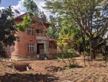 kigali Large Residential Plot with Old House for Sale in Kimihurura OnTarmac Road - Image 1