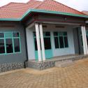 A house for sale close to the asphalt road in Kanombe